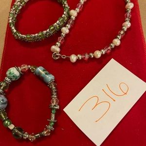 14 bracelets. Sold together